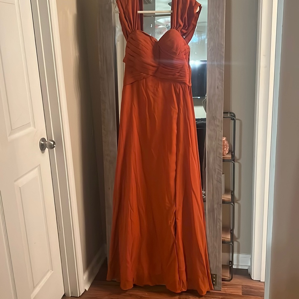 Terecotta bridesmaids evening gown with off the shoulder and slit
